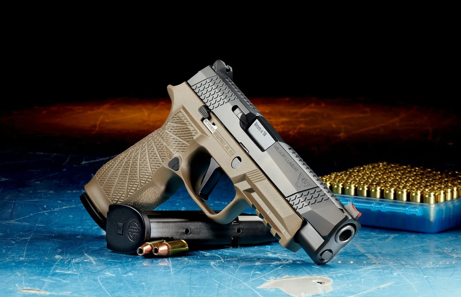 A two-tone black and silver semi-automatic pistol